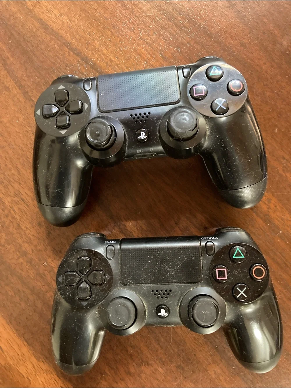 2 Black Wireless PS4 Controllers with Four PS Games